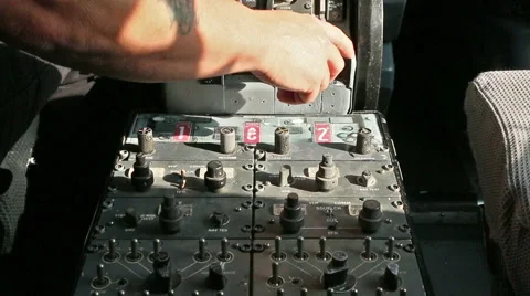 Man with tattoo operating engine controls in aircraft 04 Stock Footage 42514128
