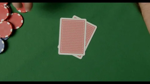 A man with a tattoo throwing Double Aces on Poker Chips. Showdown a pair Stock Footage 125982679