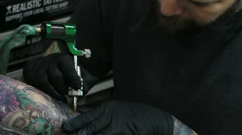 Man tattooing an arm Stock Footage 12290361