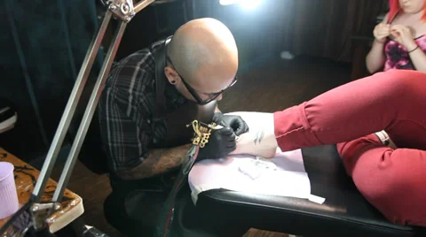 Man Tattooing Foot Stock Footage 28299741