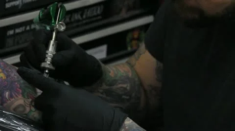 Man tattooing Stock Footage 12290145