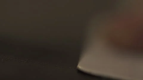 A Man With Tattoos Cutting Leather With A Sharp Knife In The Workshop Closeup Stock Footage 266127645