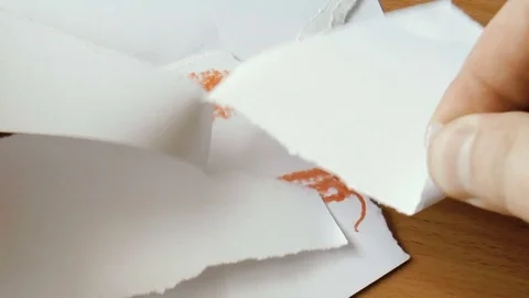 Man is tearing paper Stock Footage 79099693