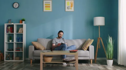 Man Tears a Sheet of Paper Out Stock-Footage 138533797