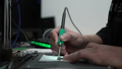 Man technician micro soldering and repairing device Stock Footage 162306757