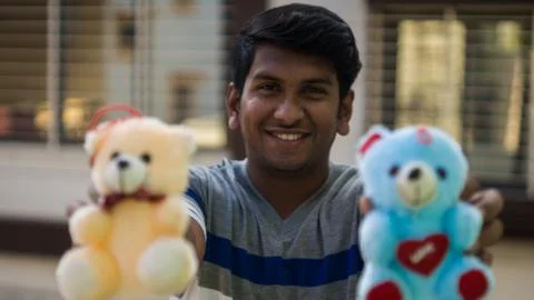 Man with teddy bears Stock Photos