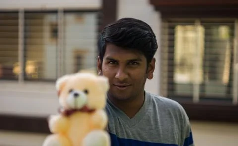 Man with teddy bears Stock Photos