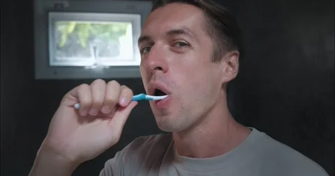 Man teeth brushing close-up first step towards teeth and gum health Morning Stock Footage 267873365