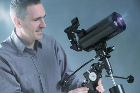 Man with telescope Foto stock