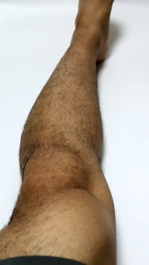 A man tensing his thighs Stock Footage 335840082