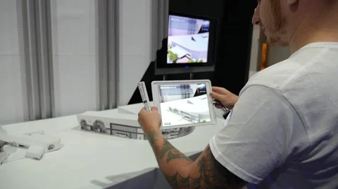 Man Testing 3D Modelling Online at Science and Technology Exhibition Stock Footage 58675274