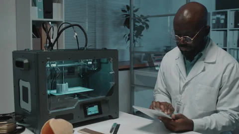 Man Testing 3D Printing Machine Stock Footage 257708662