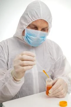 Man testing lab sample Stock Photos