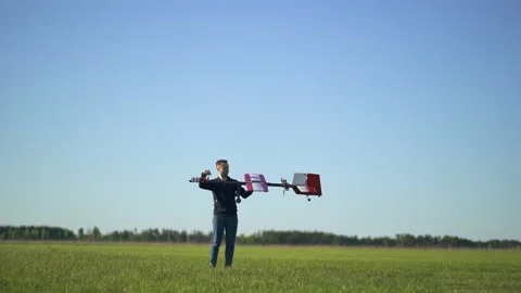 The man testing new model of radio control aeroplane Stock Footage 160424509