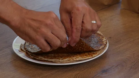 Man testing a piece of pancake Stock-Footage 217439541