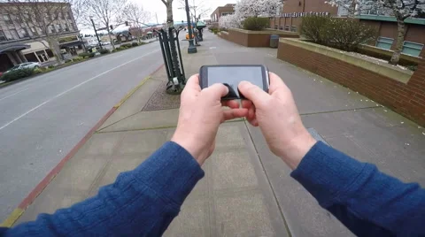 Man Texging While Walking Runs Into Pole Stock Footage 48267550