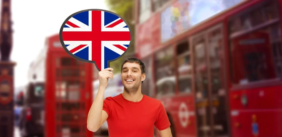 Man with text bubble of british flag in london Foto stock