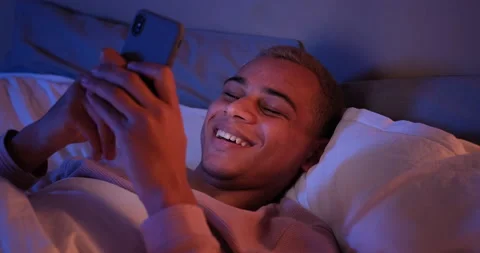 Man text messaging on mobile phone Stock Footage 145289858