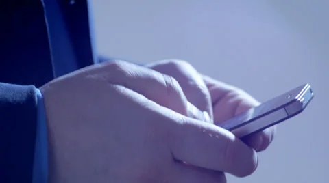 Man texting, backlit Stock-Footage 34283623