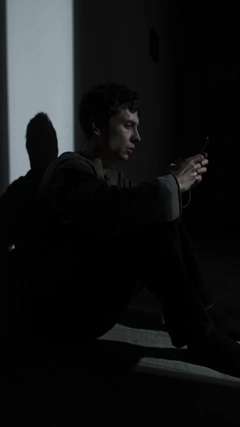 Man texting during relationship conflict, intense digital argument in the dark Stock Footage 324819446