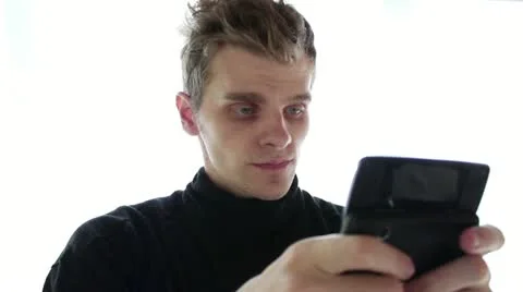 Man texting Stock Footage 12227595