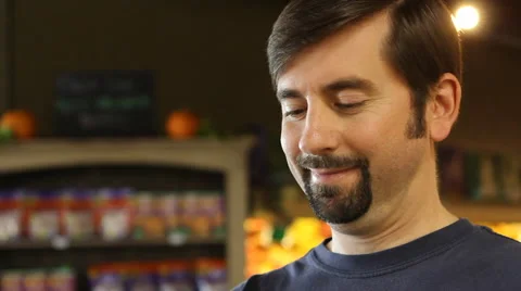 Man Texting in Grocery Store - Face CU Stock Footage 42739280