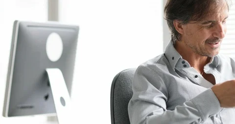 Man texting in his office Stock Footage 114726606