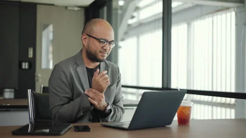 Man texting on keyboard laptop work so hard and long time that he has office. Stock Footage 211793496