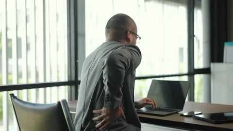 Man texting on keyboard laptop work so hard and long time that he has office. Stock Footage 211793514