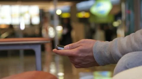Man texting on mobile phone Stock Footage 20522878