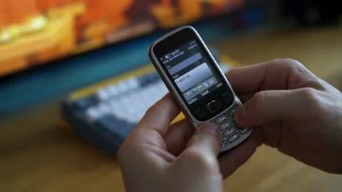 Man texting on old school phone Stock Footage 157197809