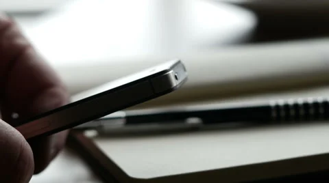 Man texting on phone, close up tracking Stock Footage 48821689