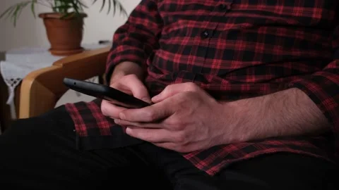 Man texting on phone Stock Footage 205856153