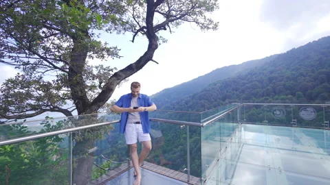 The man texting on the phone. Stock Footage 212462991