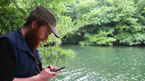 Man texting on phone Stock Footage 219283753