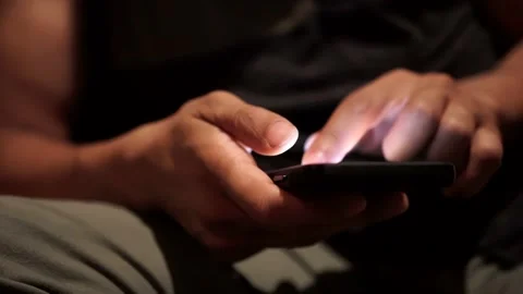 Man Texting On Phone With Hand Closeup While Sitting on Couch Stock Footage 142339221