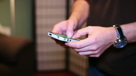 Man Texting on Smartphone Stock Footage 22196318