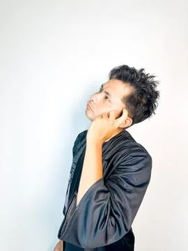 A man think about something on his head Stock Photos
