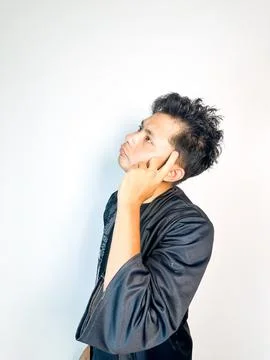 A man think about something on his head Stock Photos