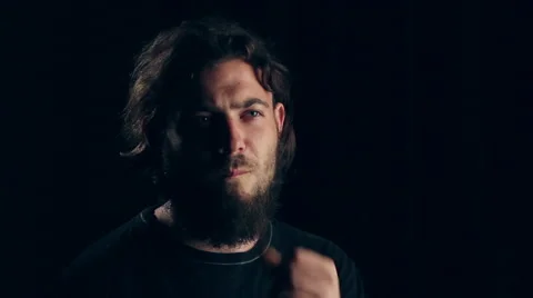 Man think with beard in dark room Stock Footage 55080220
