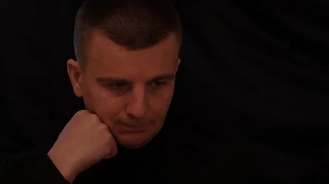 Man  thinking about solutions . Black background Stock Footage 46388311