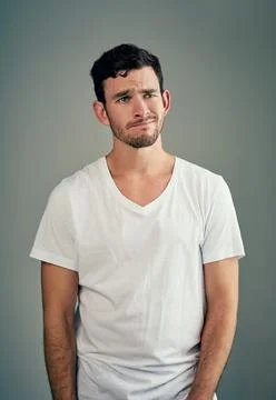 Man, thinking and confused in studio with tshirt or memory and inspiration for 스톡 사진