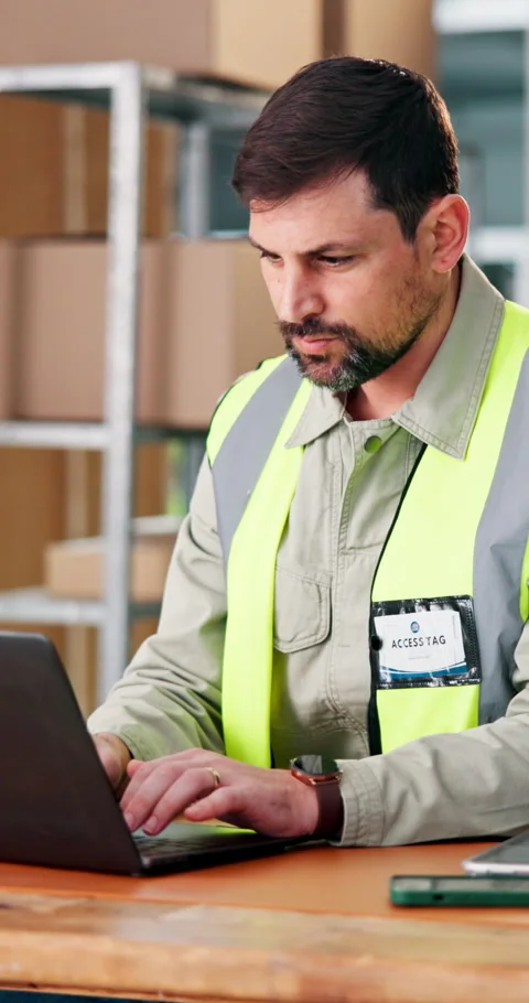 Man, thinking and logistics in warehouse with laptop, track delivery status or Stock Footage 343028562