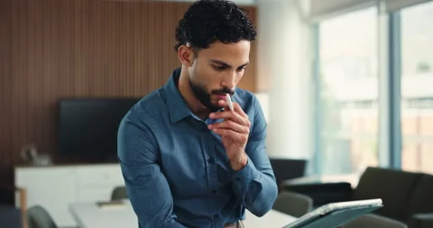 Man, thinking and pen in office with tablet for graphic design, marketing Stock Footage 326393143