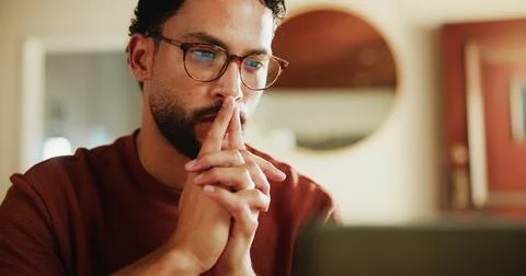 Man, thinking and remote work in home with laptop, journalist vision and glasses 스톡 사진
