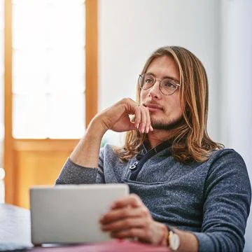 Man, thinking and vision in office with tablet, plan and consider AI software Stock Photos