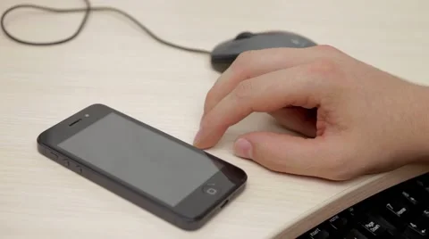 A man is thinking before to make a phone call Stock Footage 54354631