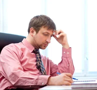 Man thinking in the office Stock Photos