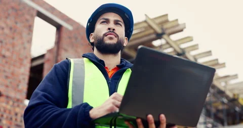 Man, thinking or laptop on construction site for planning, building project or Stock Footage 336779783