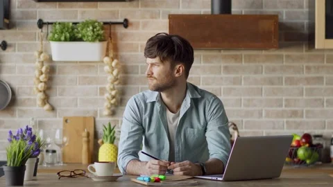 Man thinking over work at home Stock Footage 148961611